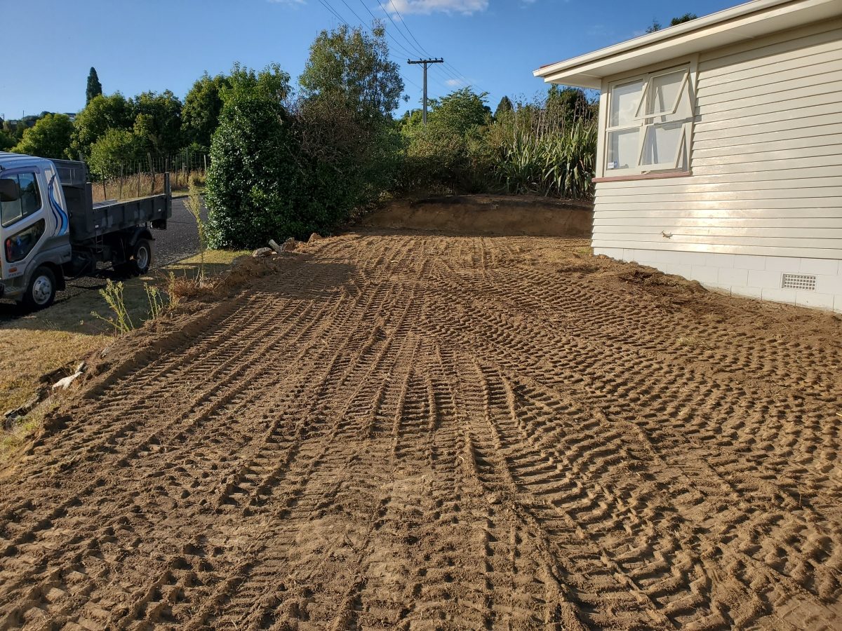 Driveway prep with tracked finish